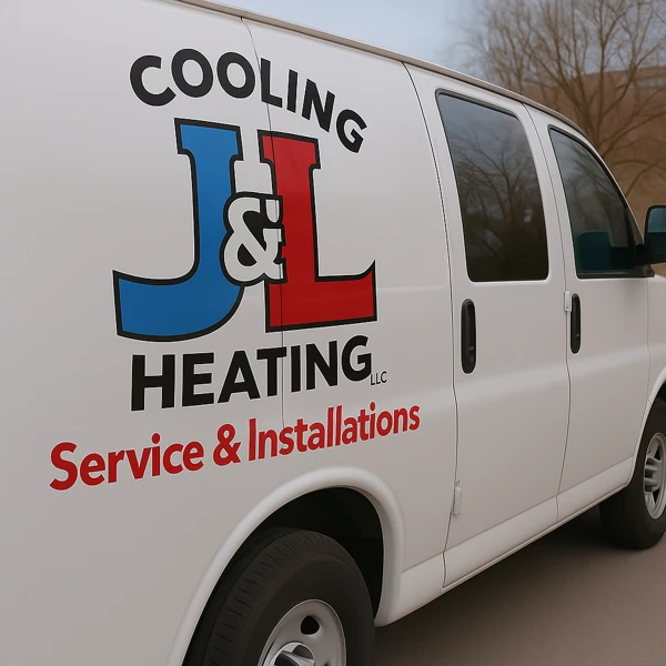 J&L Cooling & Heating service van with full company logo and branding